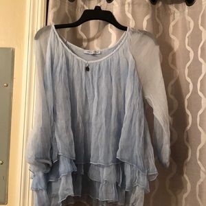 Blue long sleeve top.